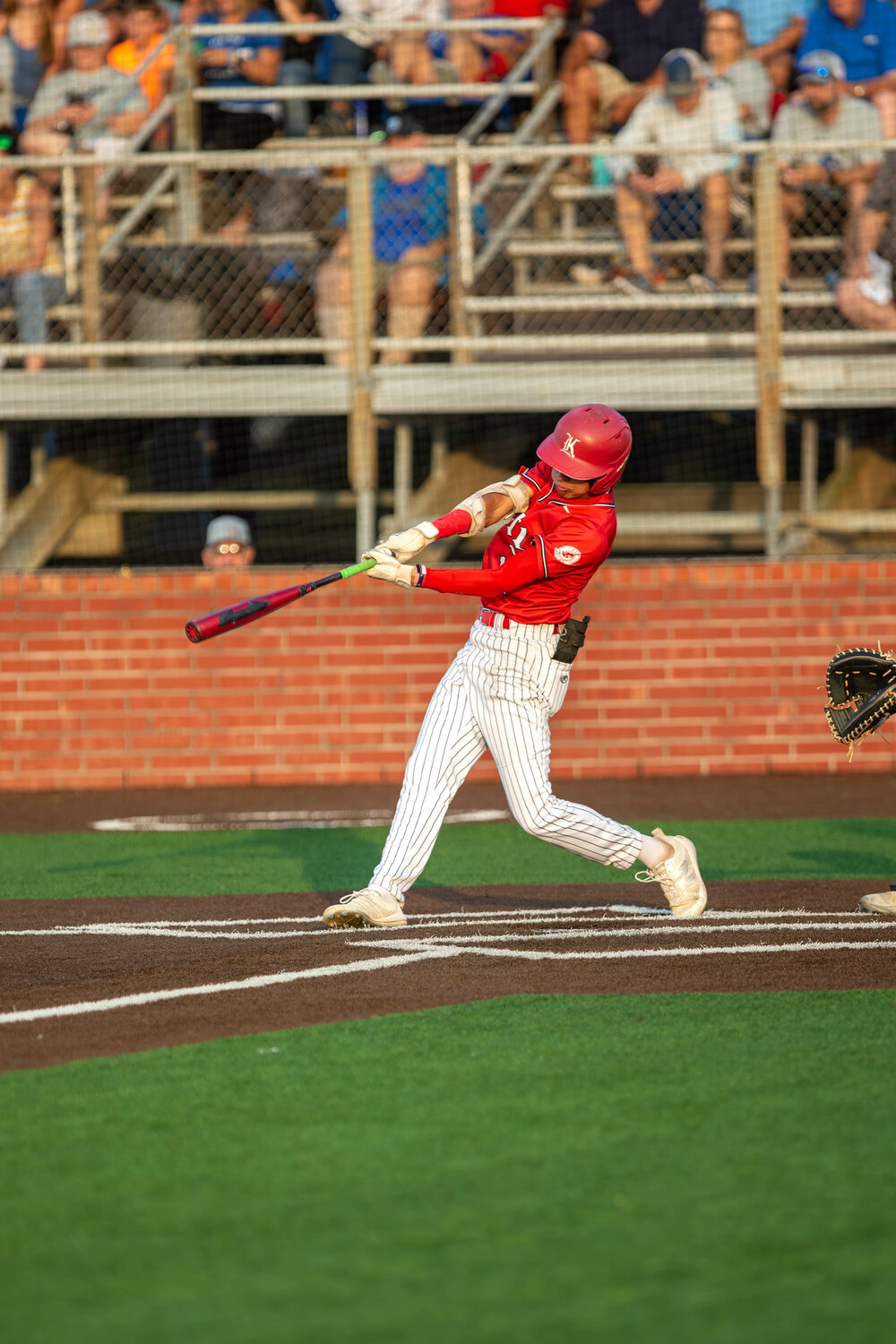 AJ Atkinson hits during Wednesday's Regional Semifinal between Katy and Clear Springs at Deer Park.